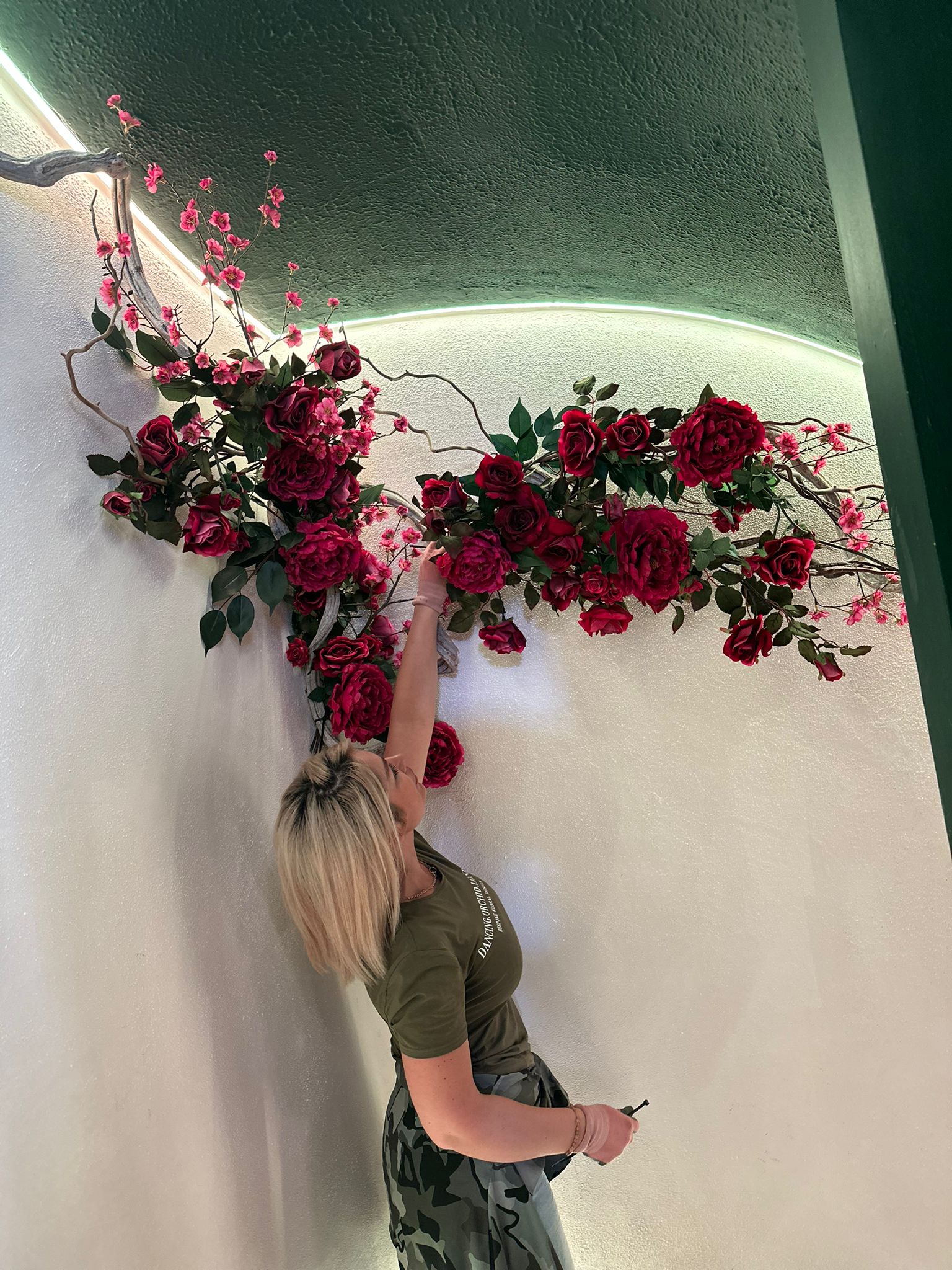 Everlasting red rose flower on wall
