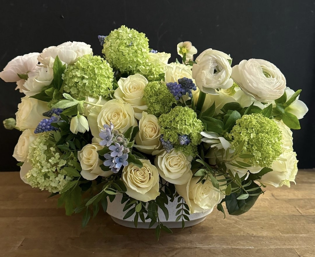 white vase with white rose