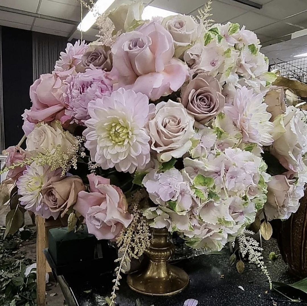 Wedding arrangements with rose decor